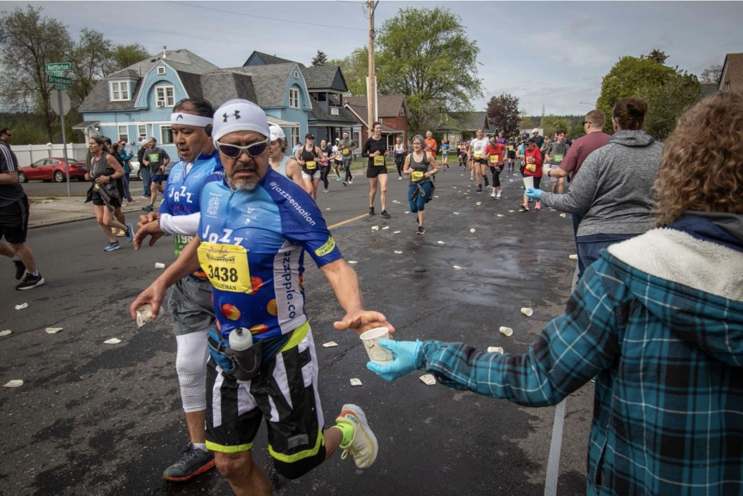 Bloomsday runner Martin Ibarra at the last water station on Broadway Street. 
